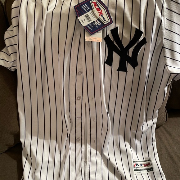 AUTHENTIC YANKEE JERSEY BY MAJESTIC. #27 STANTON. Never worn!!